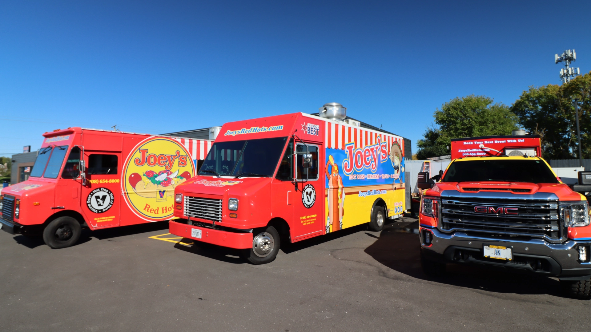 Joey's Red Hots branded food trucks and catering vehicle outside the Orland Park restaurant
